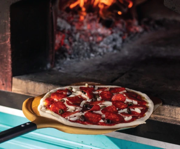 En Una Pizza Vilassar de Mar nuestro horno de piedra siempre está trabajando